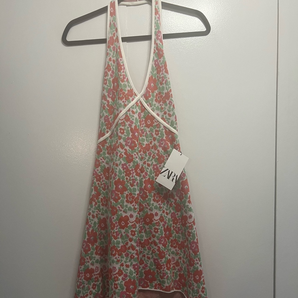 Mini floral halter dress from Zara. Fun and flirty. New with tags. Size M.